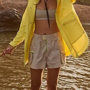 Free People “Morning Meadow” hiking Shorts in Light Tan with neon yellow details